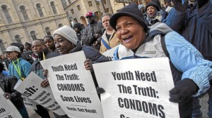 Young people protesting for condom awareness and safe sex education.