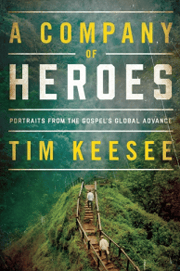 Book cover of 'A Company of Heroes' by Tim Keesee featuring a rural landscape with a wooden bridge.