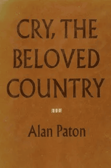 Book cover of 'Cry, the Beloved Country' by Alan Paton with warm earthy tones.