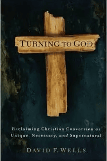 Wooden cross with 'Turning to God' inscription for spiritual reflection.