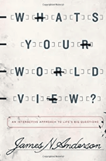 Abstract image with scattered letters and the title 'Between Two Cultures'.