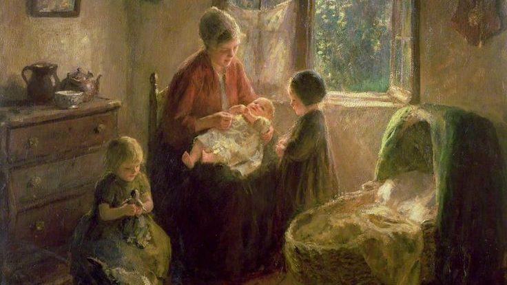 Warm scene of a mother with three children in a rustic home setting.