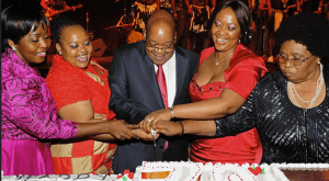 Group of diverse women and man celebrating together at an event.