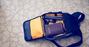 Travel bag with toiletries and accessories for short-term travel.