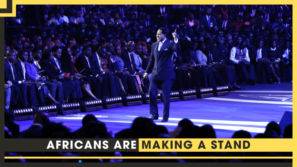 African leaders and audience at a conference on prosperity gospel and faith.